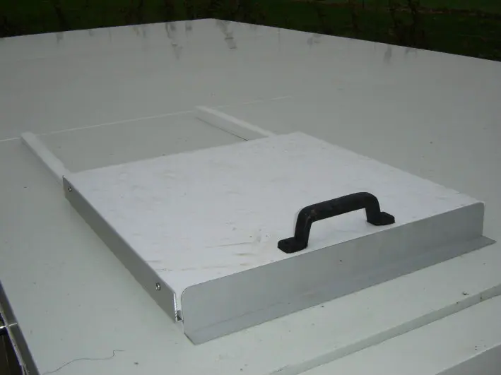 Trappe de remplissage avec couvercle coulissant pour refroidissement des carcasses IF